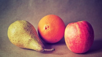 Obst, Birne und Orange als Symbolbild für unterschiedliche Doktortitel